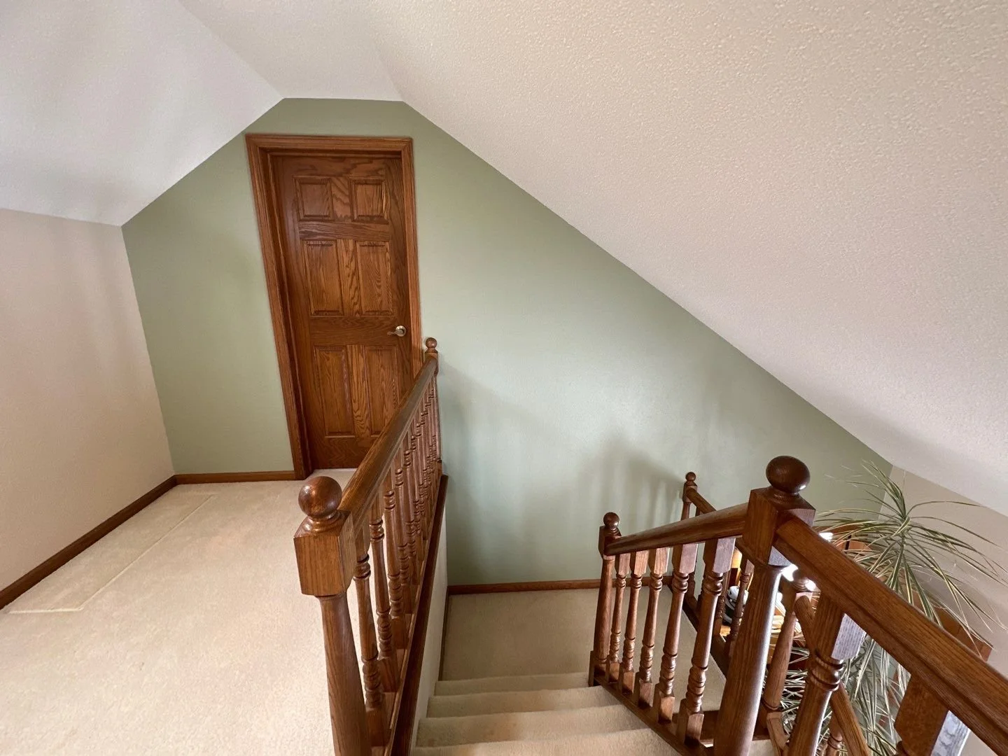 White ceiling with cream and green walls allow for sharp clean edges to show by Barefoot Painter LLC in Cameron Wisconsin