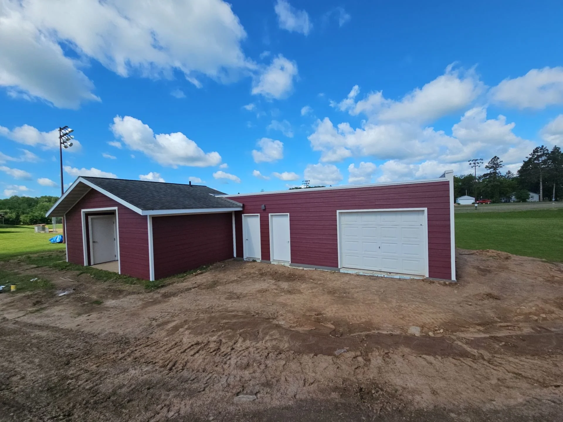 Birchwood High School football field concession stand and press box painting in Birchwood Wisconsin