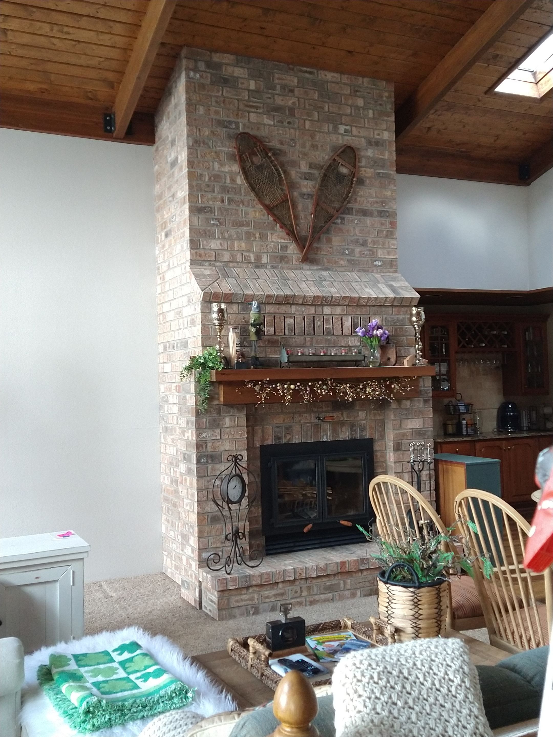 Gray tones bringing out the natural beauty of stone fireplace near Hayward Wisconsin
