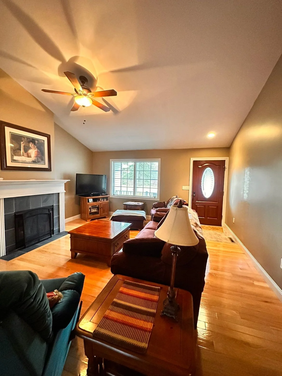 Living room makeover using bright white for ceilings and warm tones on walls in Ashland Wisconsin