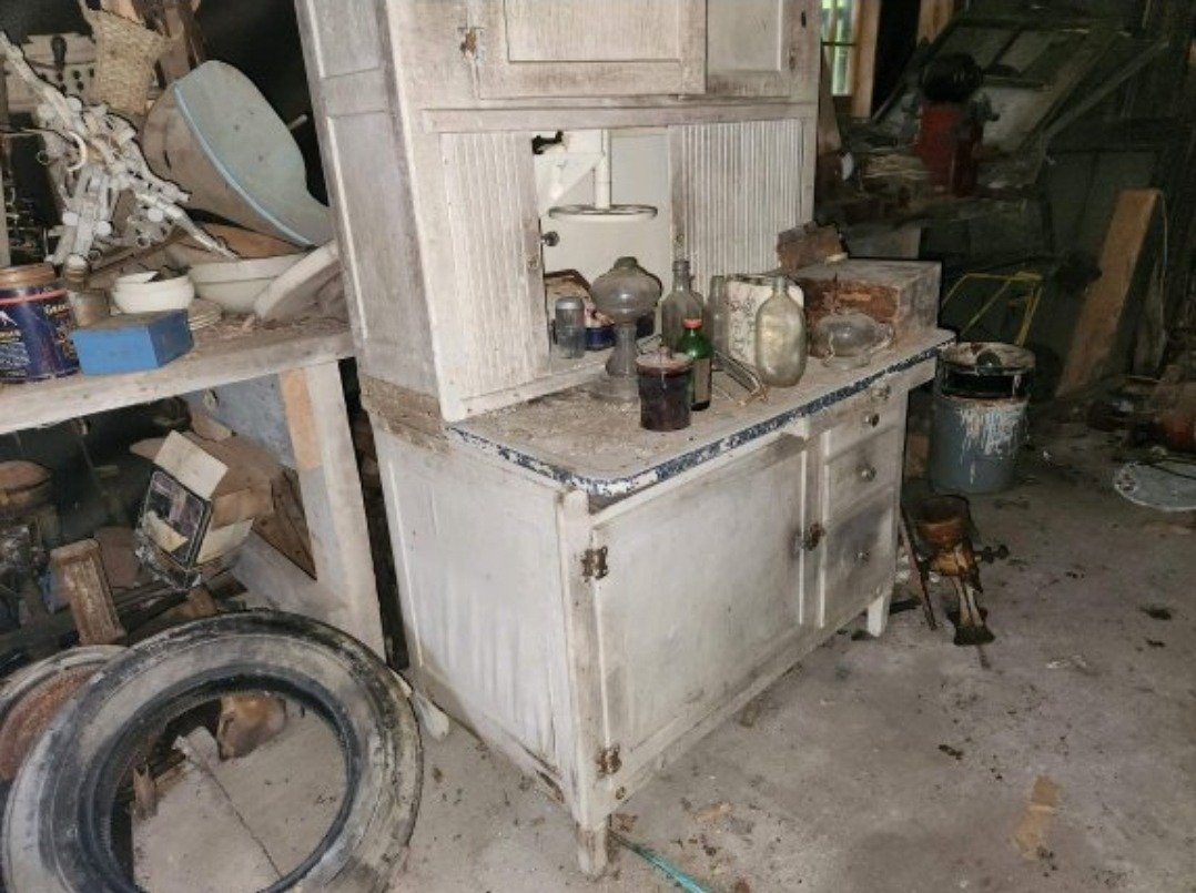 Hoosier cabinet in scrap pile