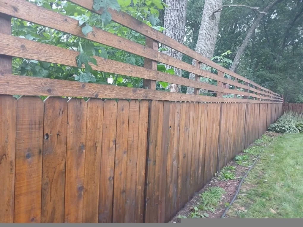 Fence oil staining in Eau Claire Wisconsin