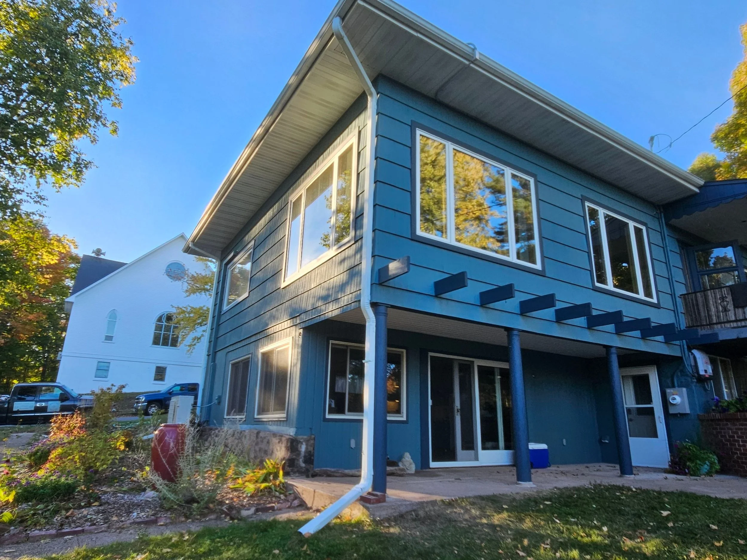 Exterior painting in Bayfield, Wisconsin using multiple exterior blue color