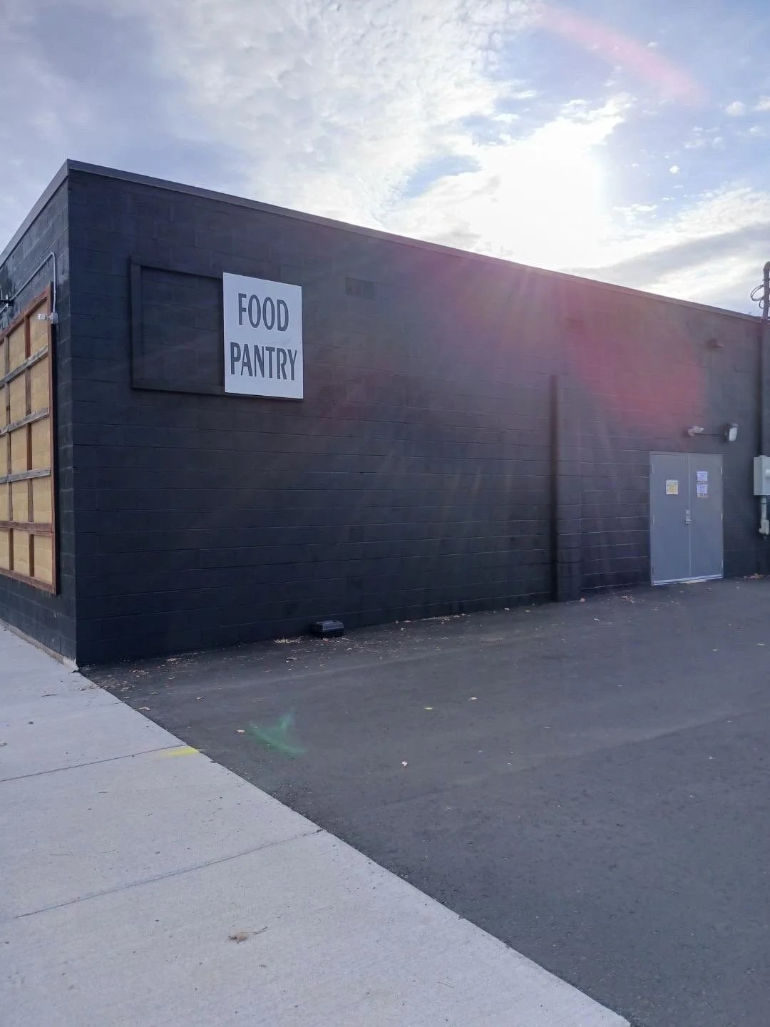 Rusk County Food Pantry exterior painting using Tri-Corn black