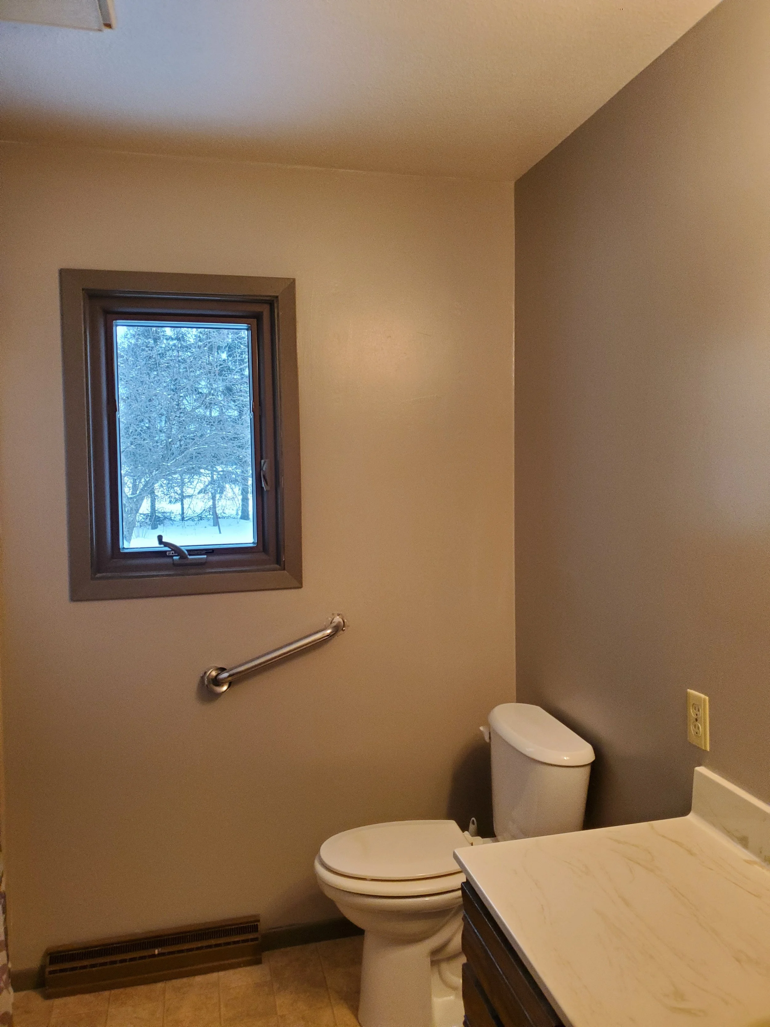 Wallpaper removal with drywall repair and interior painting in Bruce, Wisconsin