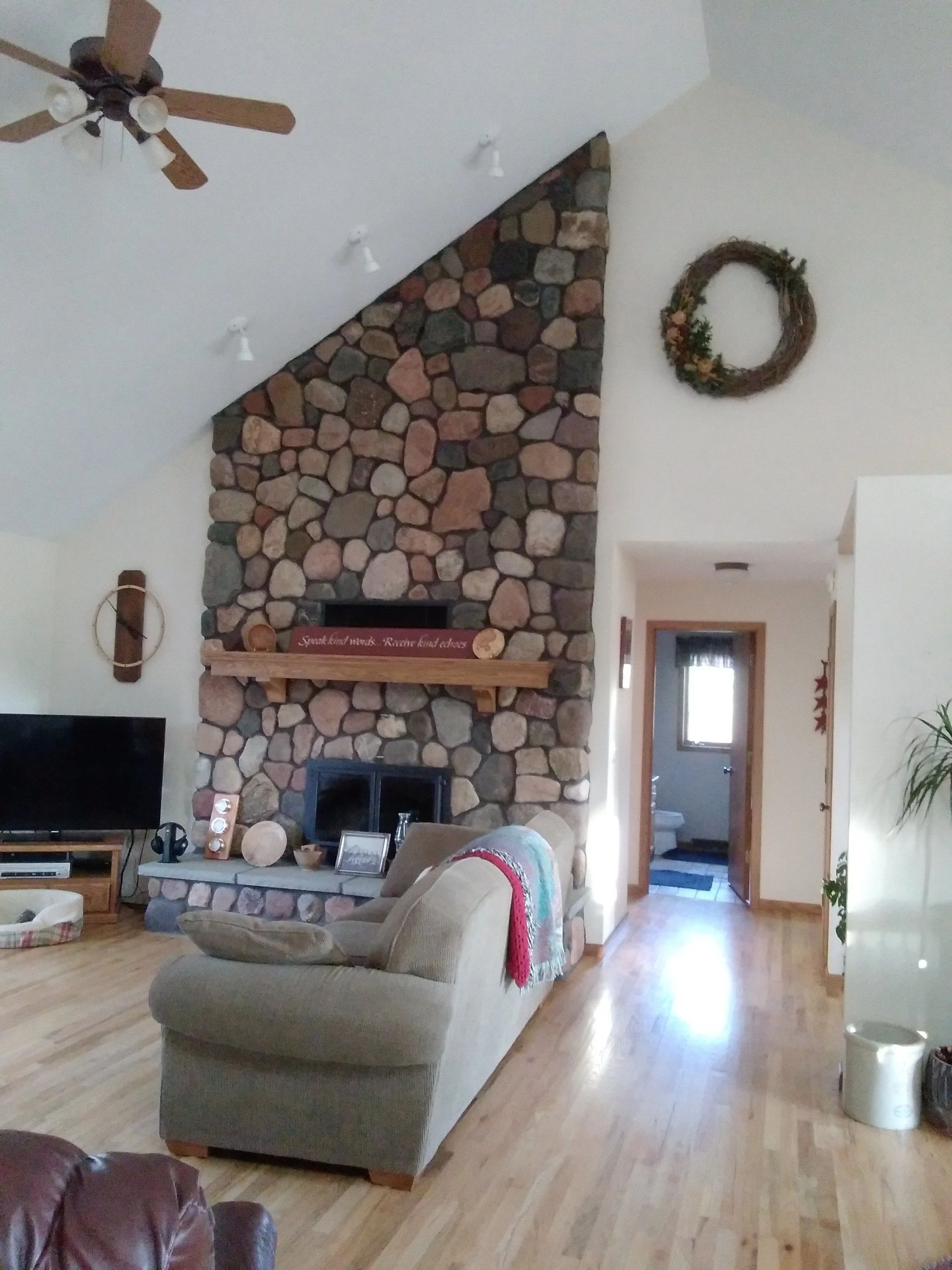Stone fireplace with white walls in Hawkins Wisconsin