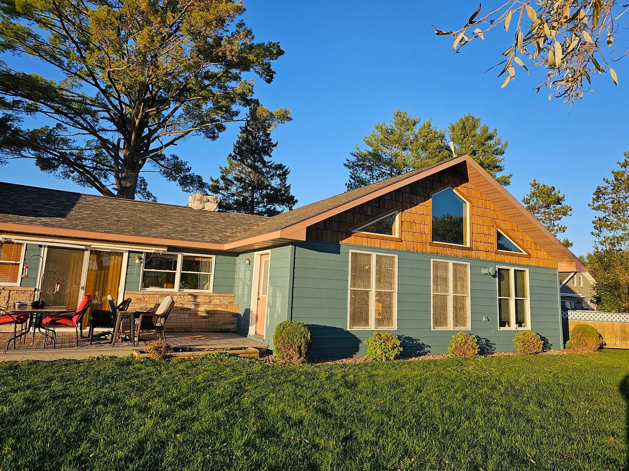 Lakeshore home in Holcombe Wisconsin on the Holcombe Flowage painted and stained by Barefoot Painter LLC