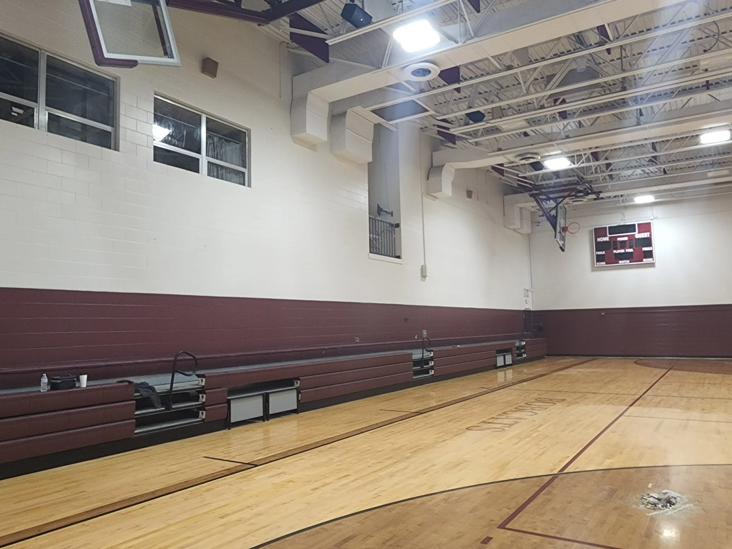 Church in Gilman Wisconsin with plastic and flooring protection while ceilings are c repainted.