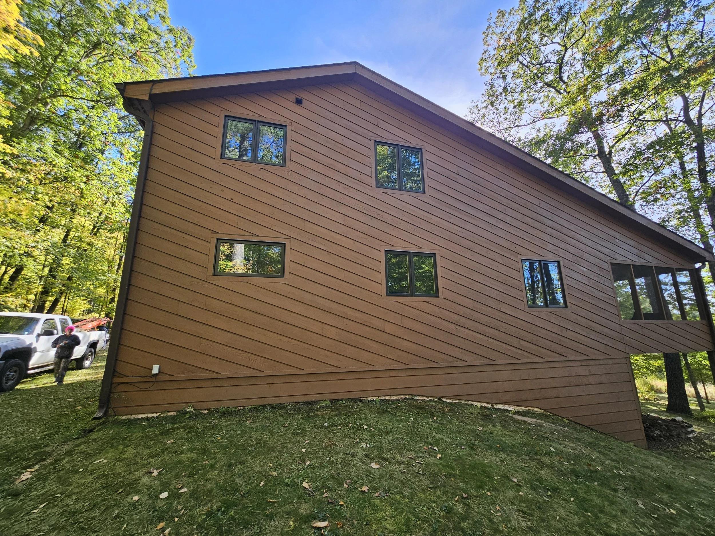 Lake home staining in Cumberland Wisconsin