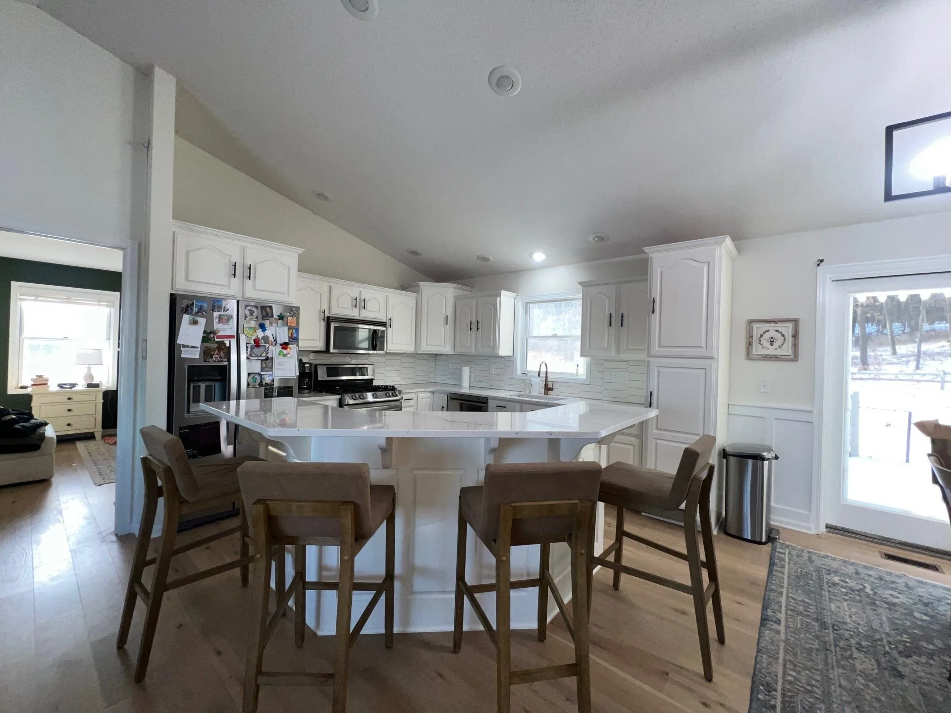 Painted kitchen cabinets professionally sprayed by Barefoot Painter LLC in Barron County, Wisconsin