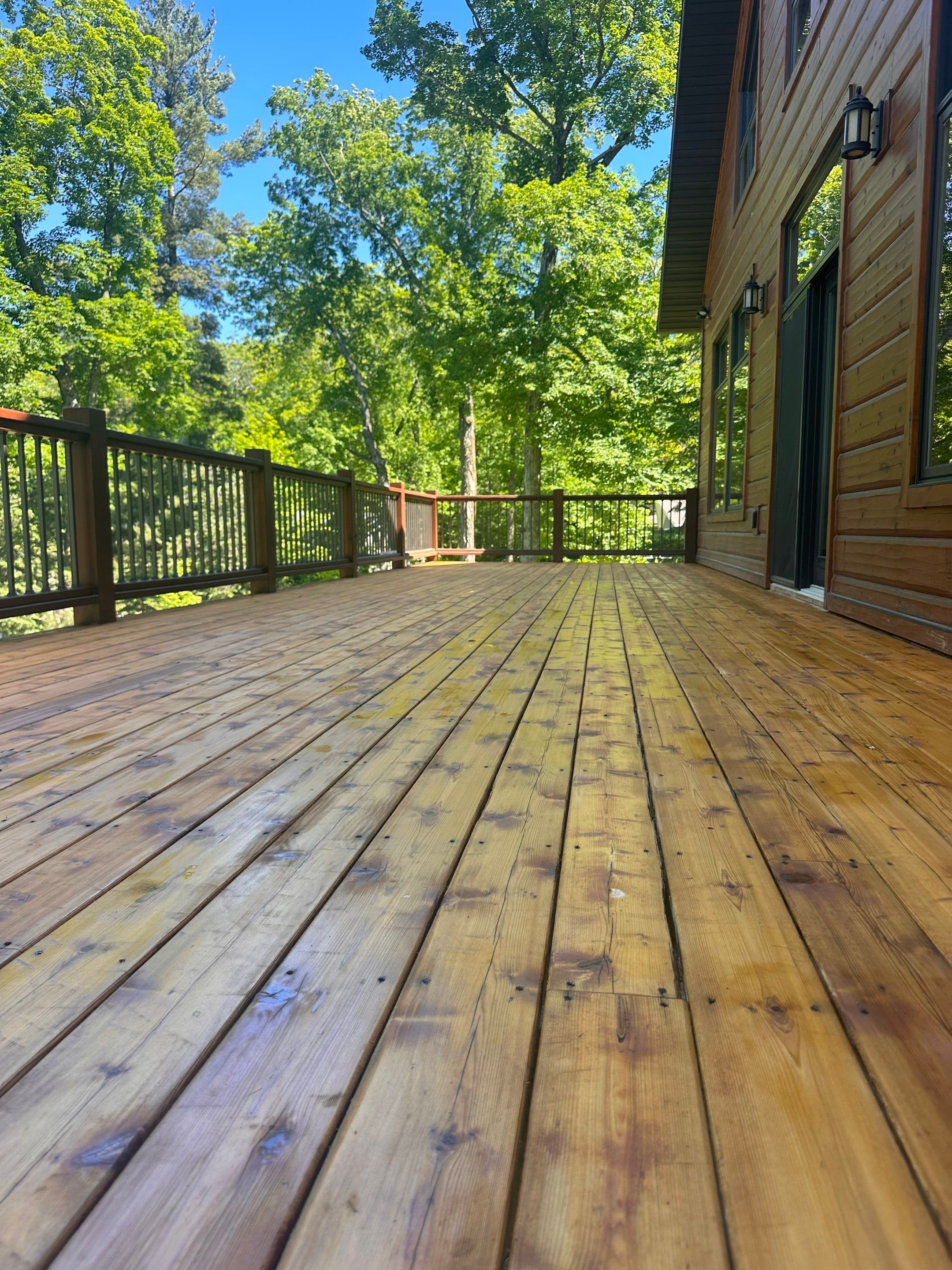 Deck staining in Hayward Wisconsin Power washed old stain removed