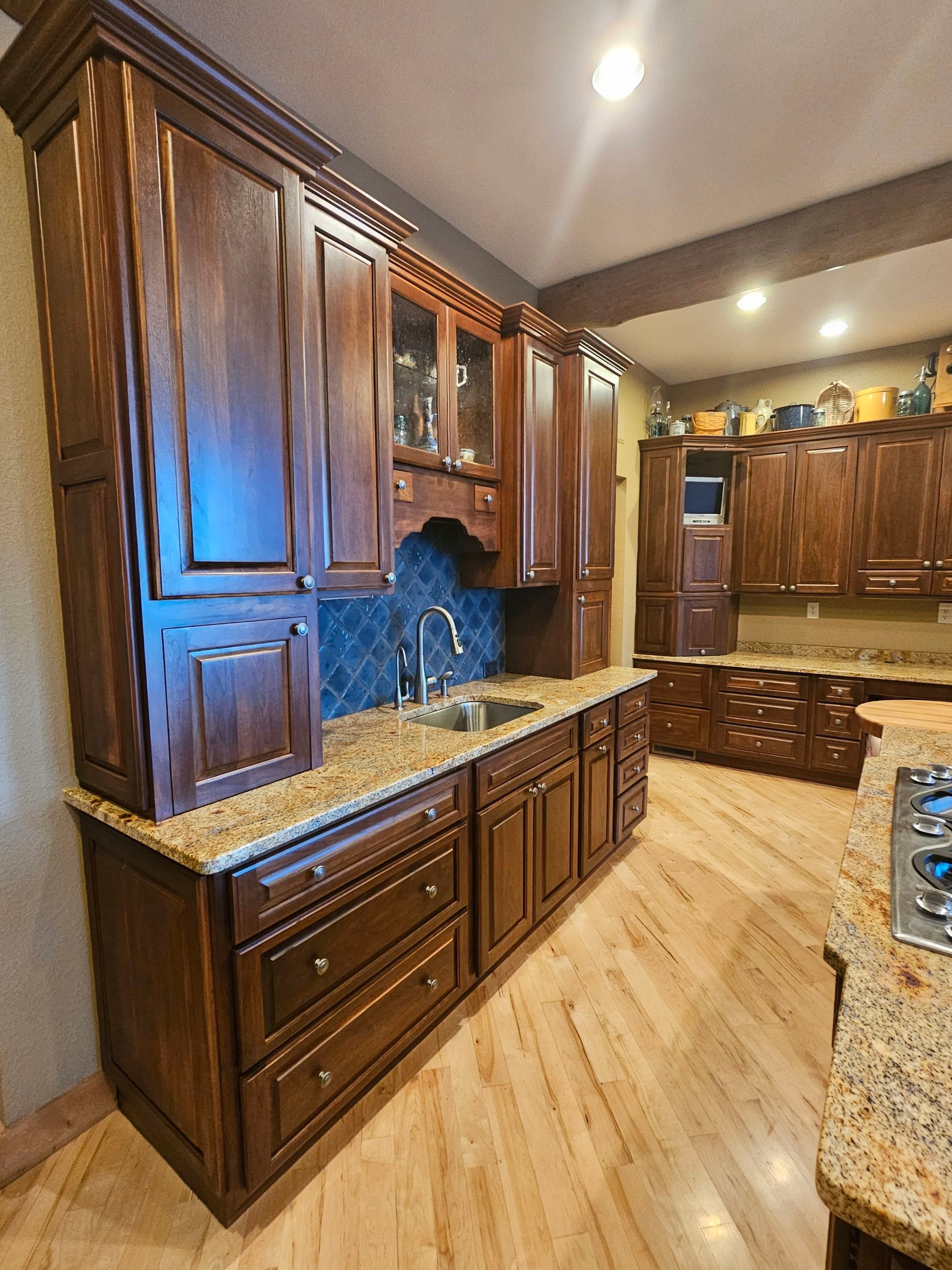Walnut refinished cabinets in Island Lake Wisconsin