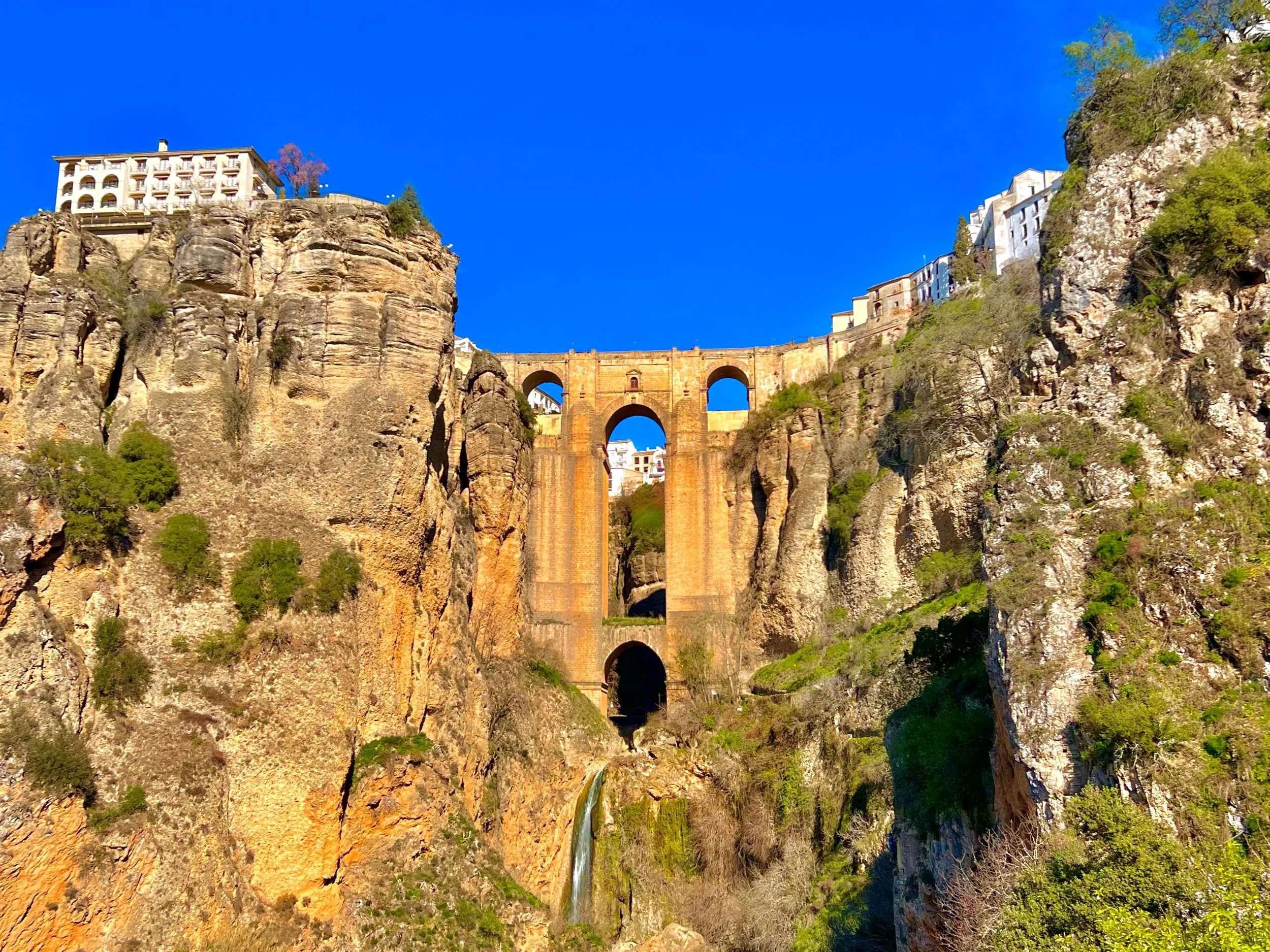 A scenic view of a deep canyon in Ronda, Spain.