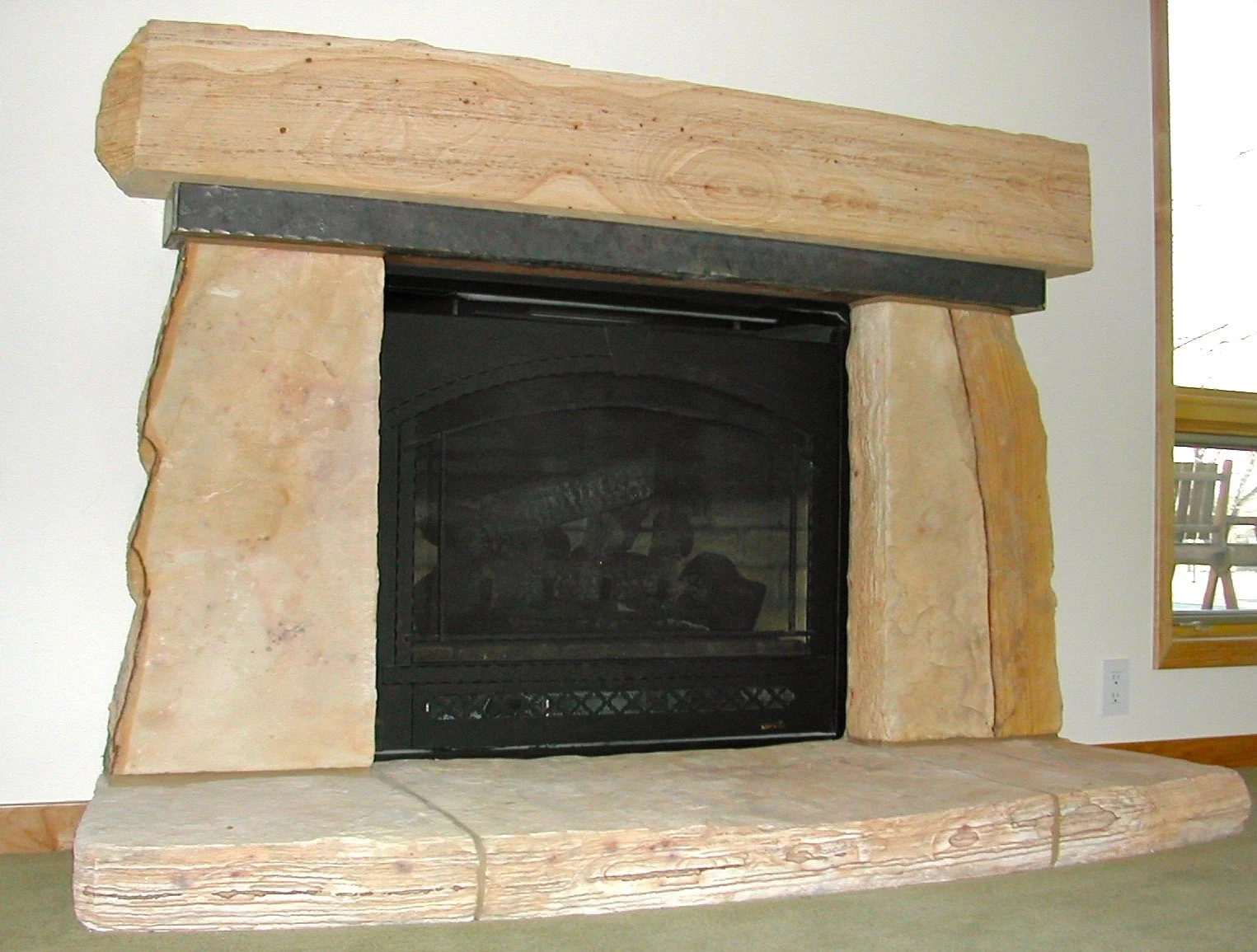 21 Custom Buff Slab Fireplace.jpg