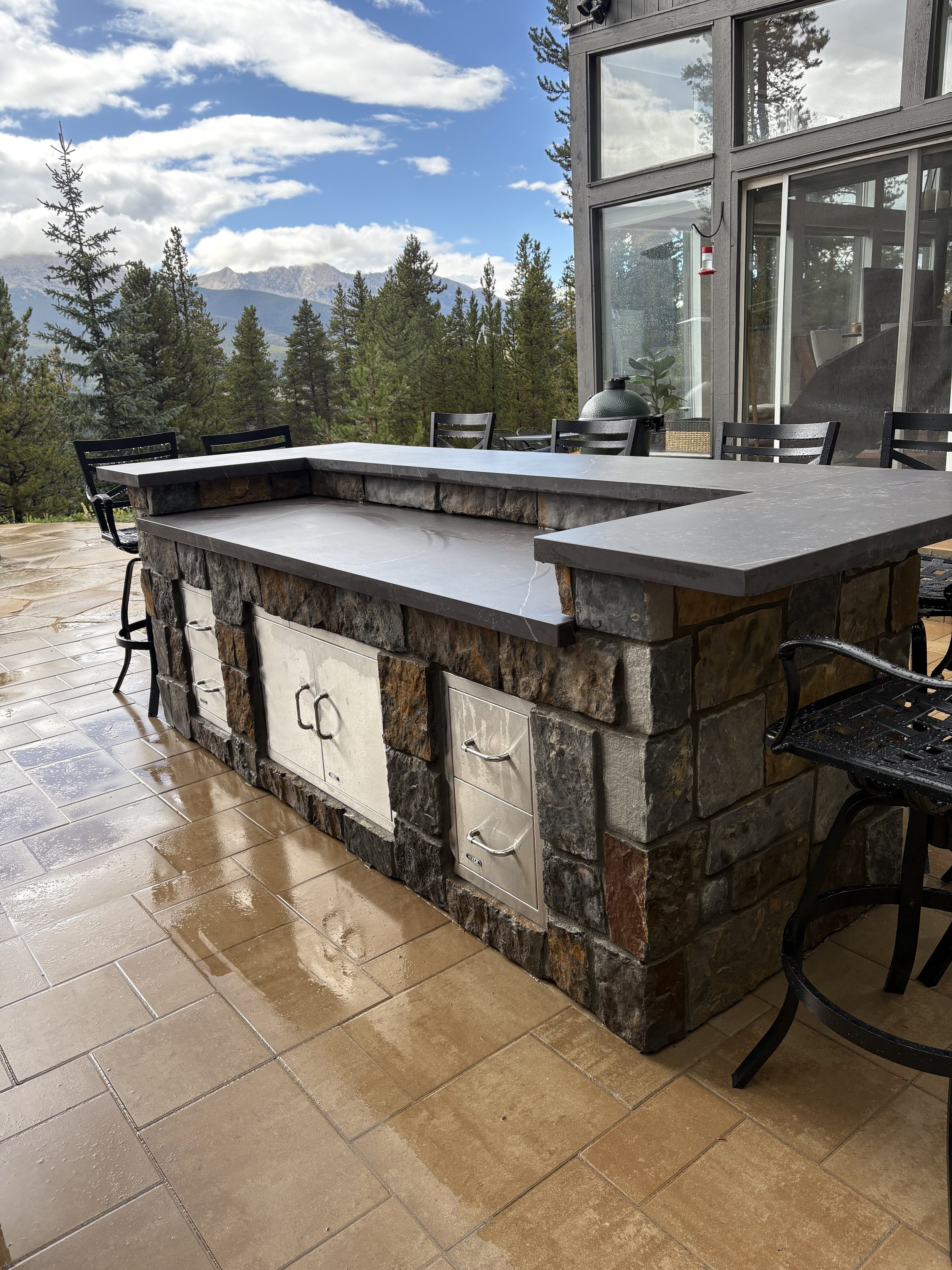 This outdoor kitchen was built using OLF (outdoor living foundation) base to build a more economical masonry based outdoor kitchen.