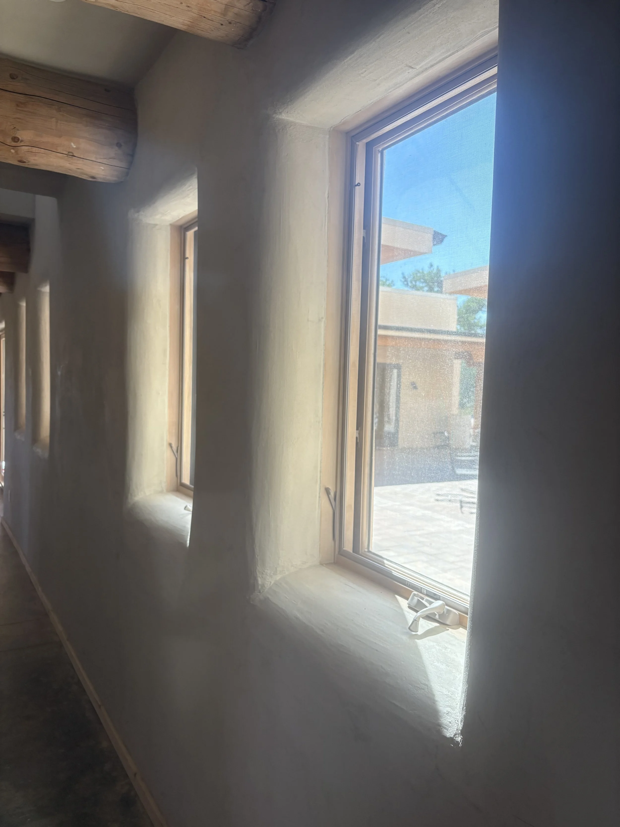 Inside the CEB house.  All plaster