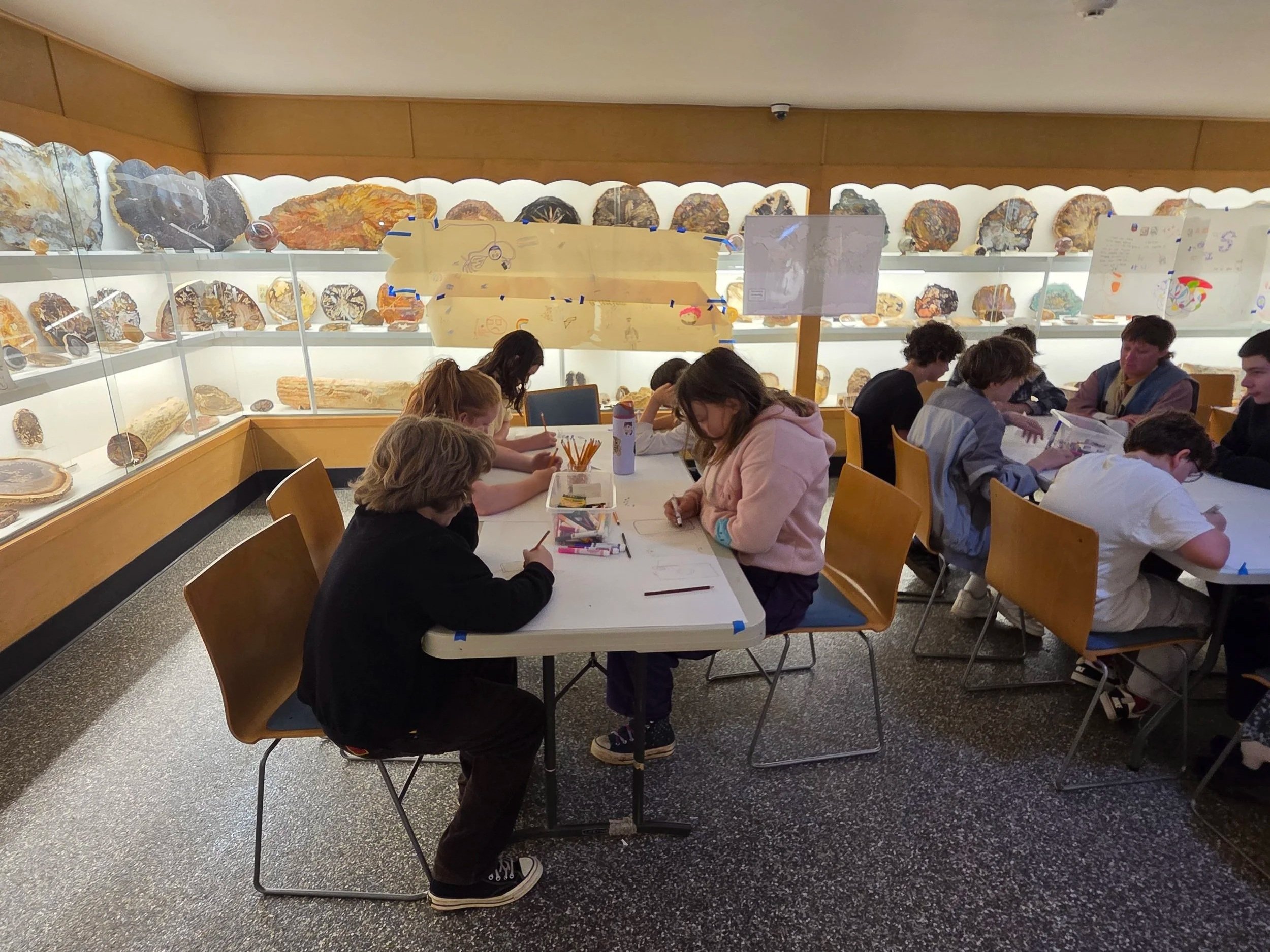 Cottonwood middle school students working on activity related to minerals in cellphones