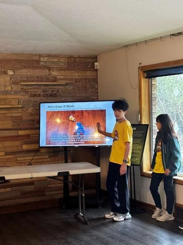 Lego Krafter team members presenting on project