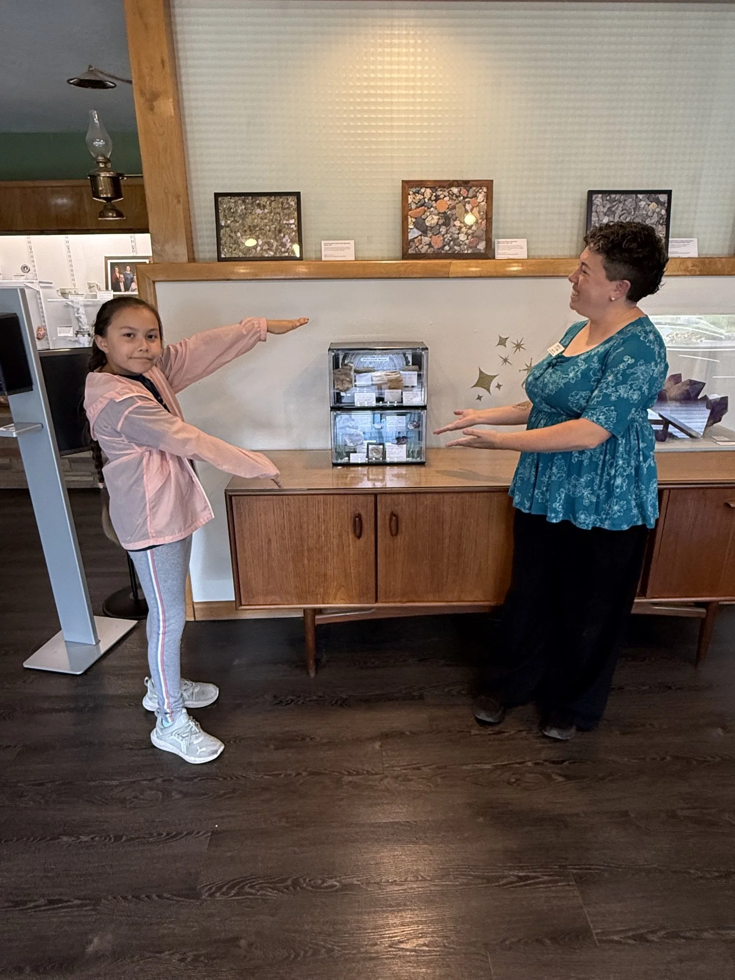 TVGC Junior Club Member, Isabella Mozingo with Angela Piller, Collections Manager, posing in front of her display.