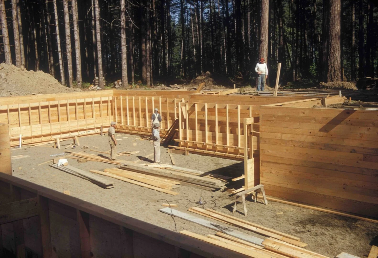 Wooden walls have been built to frame out the basement.