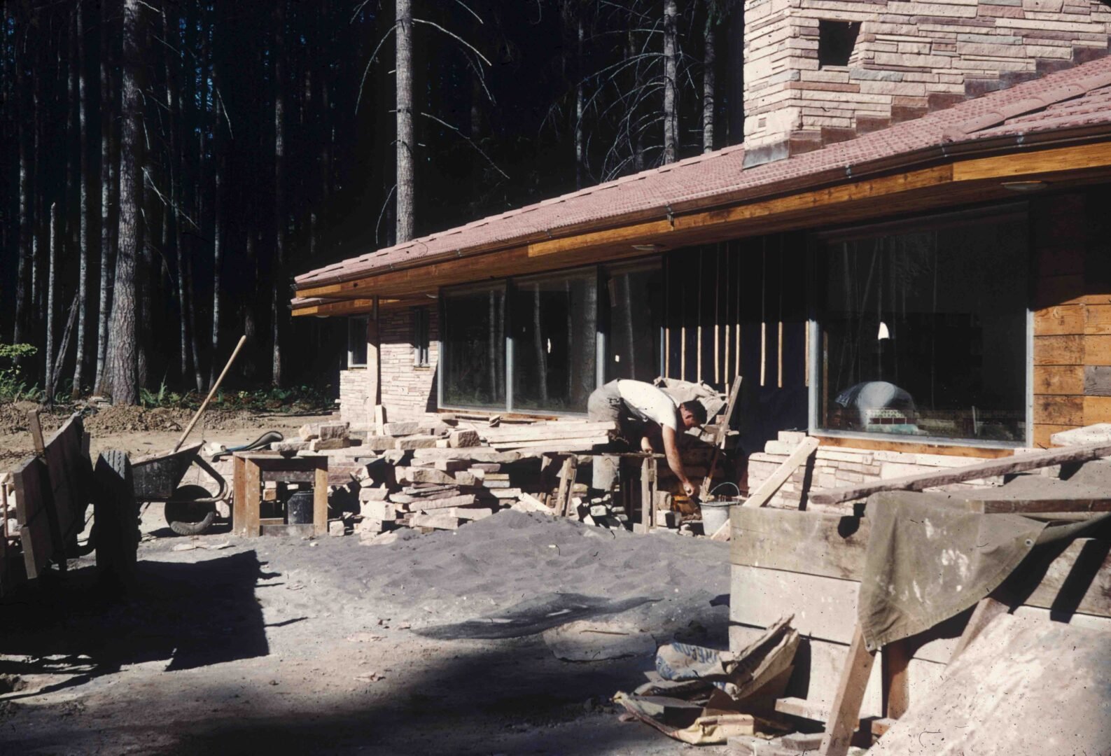 The roof has been started at this point, and here we see stonework for the walls being added