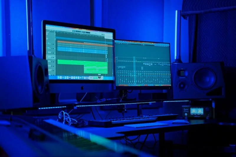 recording studio DAW Logic Pro desk 2 screens blue light analog
