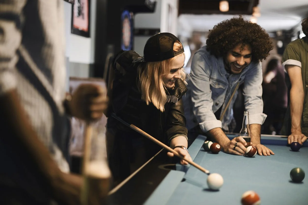Playing pool on Olhausen Billiards pool table.