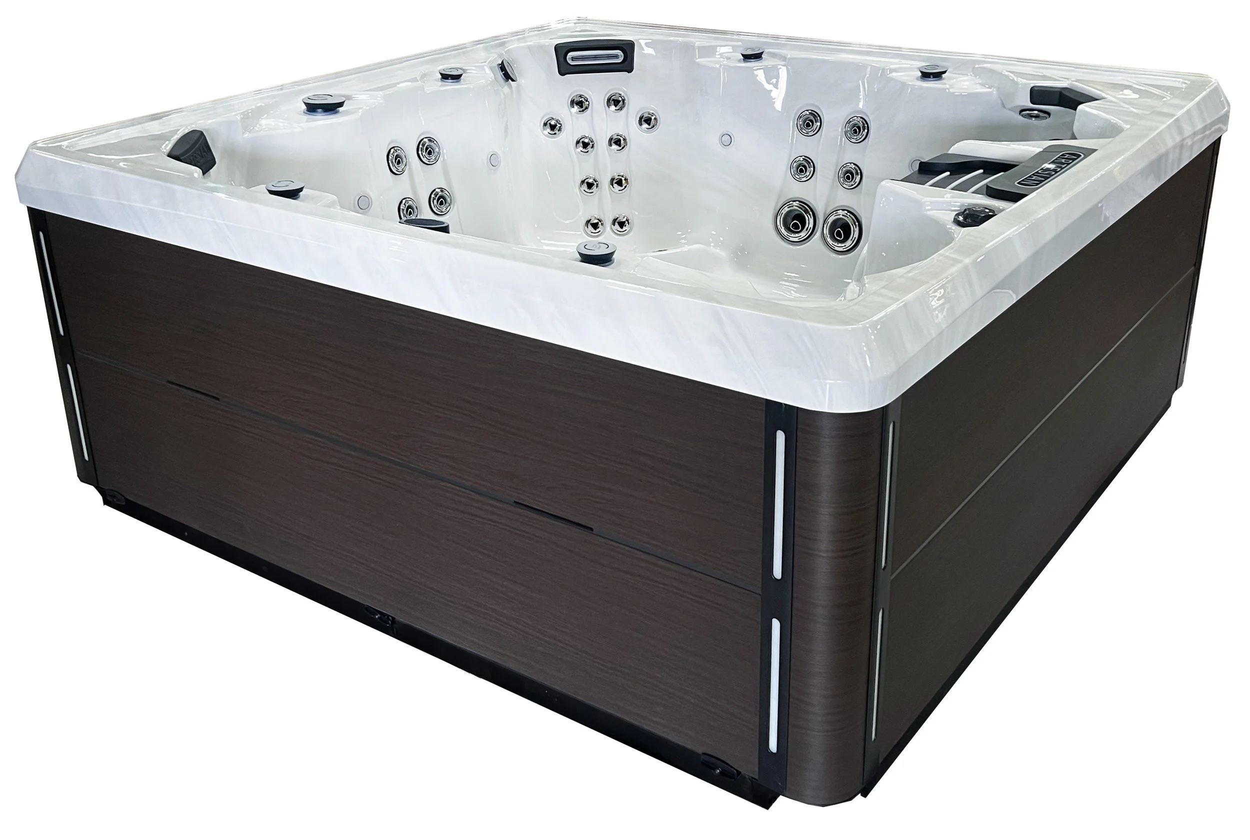 A modern outdoor hot tub with multiple jet nozzles, headrests, and electronic controls, featuring a white interior and dark wood panel exterior.
