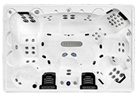 A white hot tub with multiple jets, control panels, and seating areas.