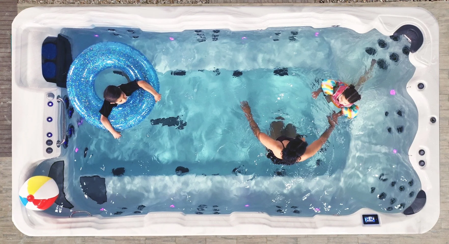 A swim spa for family fun in the backyard