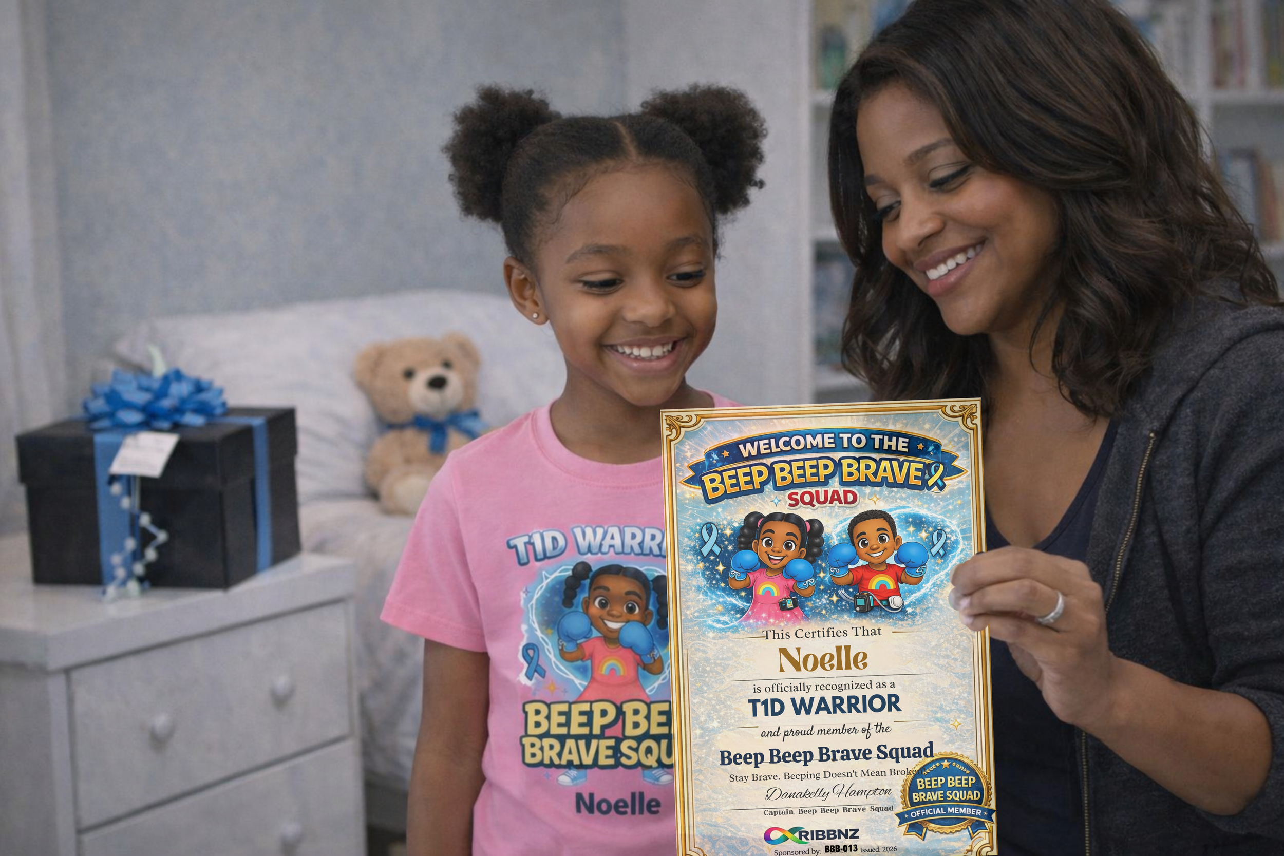 Noelle receiving her certificate while wearing her bbb tshirt.png