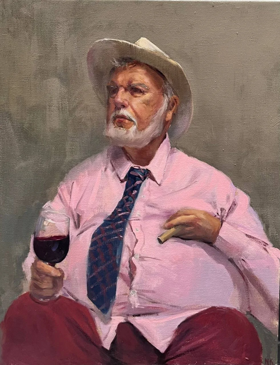 A man in a pink shirt 