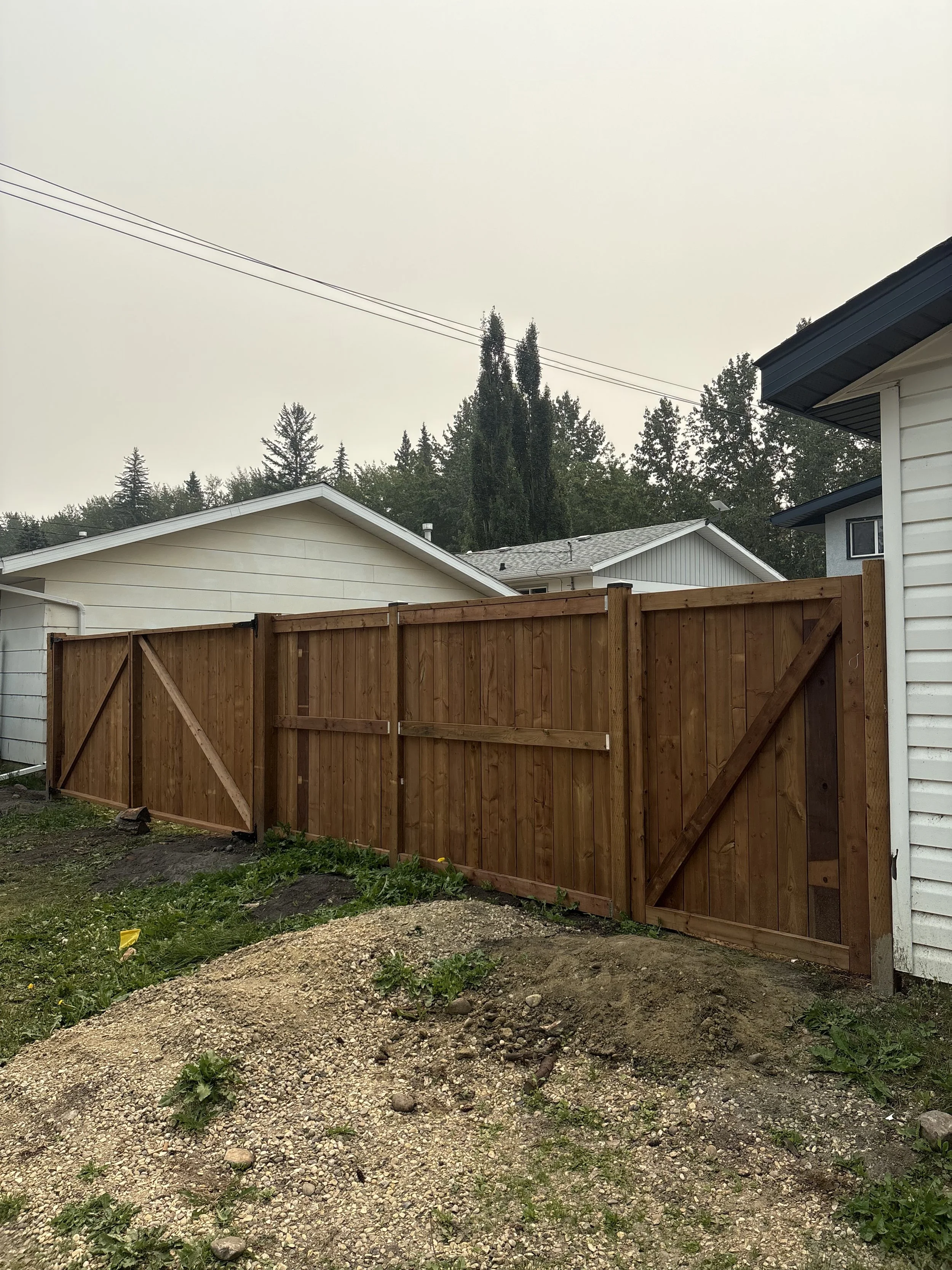TREATED WOOD FENCE