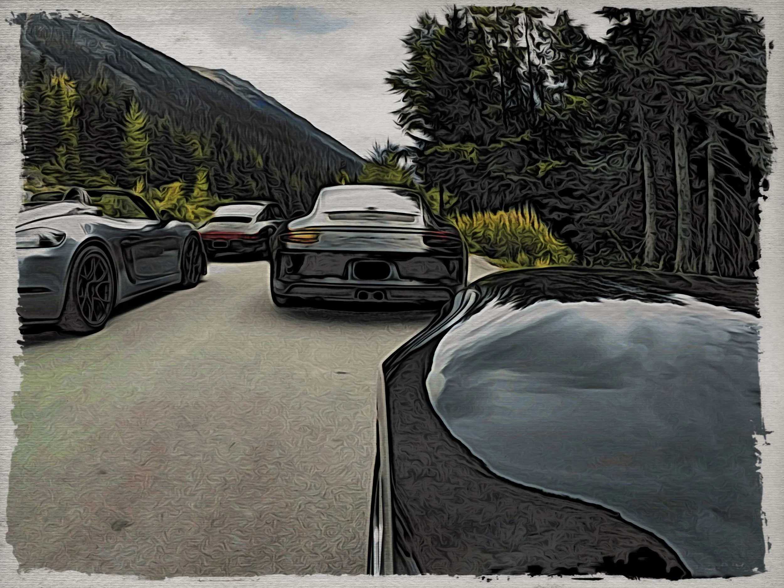 Multiple luxury sports cars parked on a mountain road surrounded by trees and forest, with hills in the background, under an overcast sky.