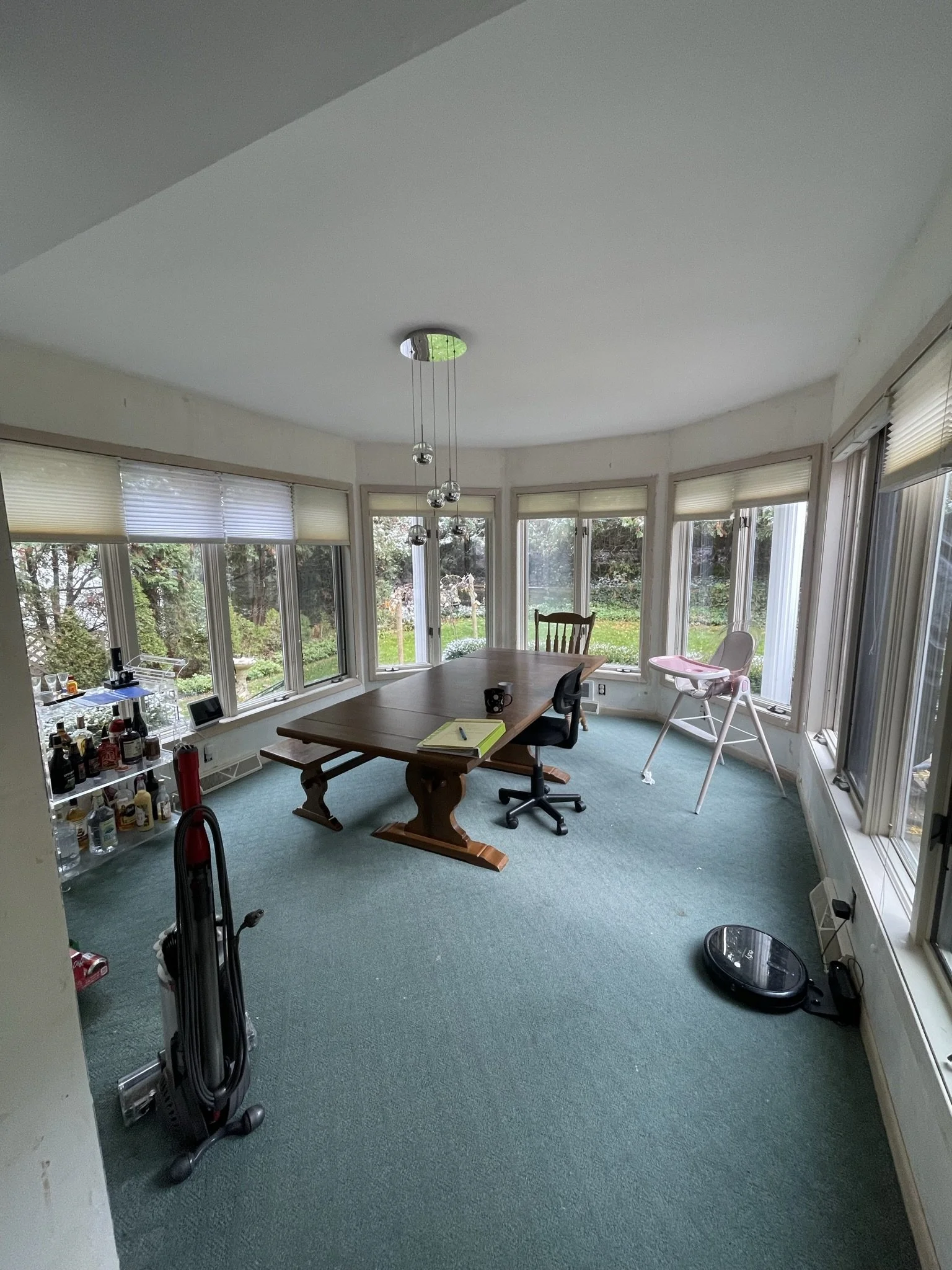 Sun Room in Port Washington BEFORE Installing LVP Flooring and Wall Paneling.