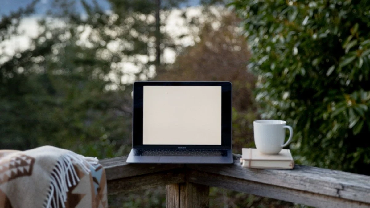Computer Screen on a porch with trees in the background for a blogpost with What is Culture Videos for kids