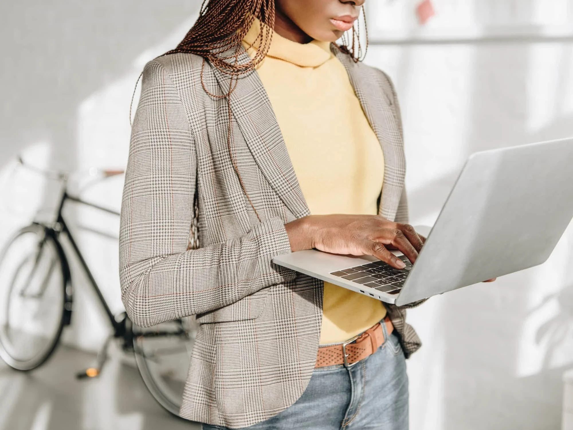 Woman on a laptop for a blogpost about 6 types of literacy.