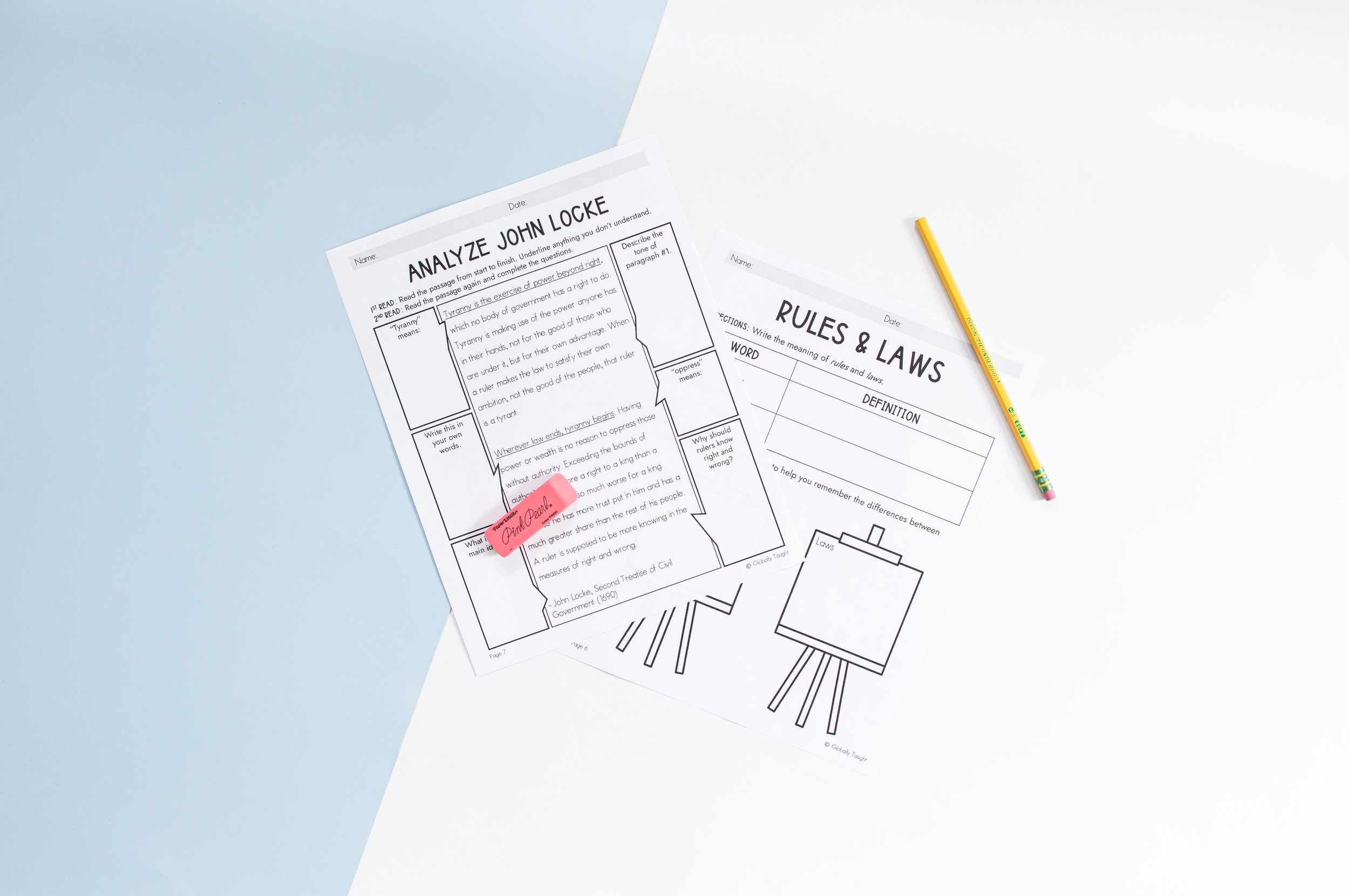 Educational worksheets  from Globally Taught's Government Unit for Kids on rules and laws, with a yellow pencil on a white surface, one worksheet marked with a pink heart sticker.