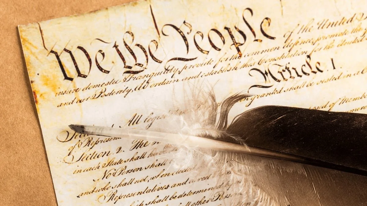 Preamble to the Constitution with a quill for a blogpost about the purposes of the preamble