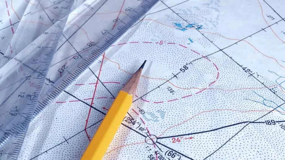 Map, ruler and pencil cover image for a blog post about Globally Taught's geography lessons