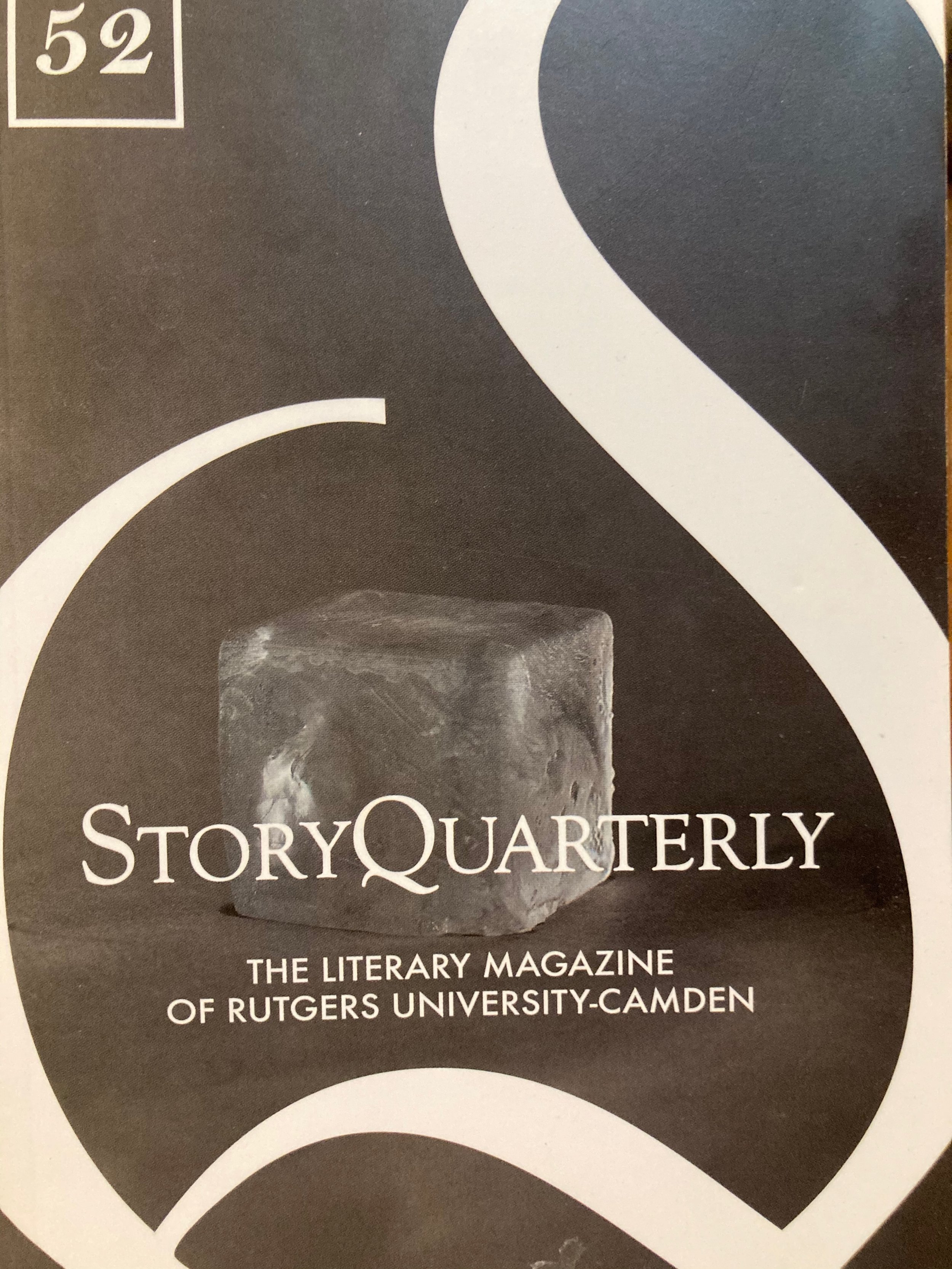 Cover of StoryQuarterly literary magazine featuring a black background with white curved lines and an ice cube in the center, with the title and subtitle in white text.