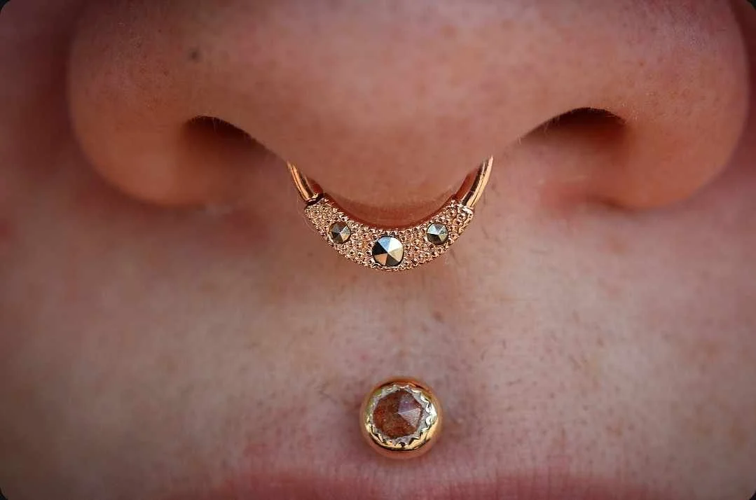 Septum piercing and gemmed Janna by BVLA Body Vision Los Angeles
rose gold and marcasite

Philtrum piercing with gold