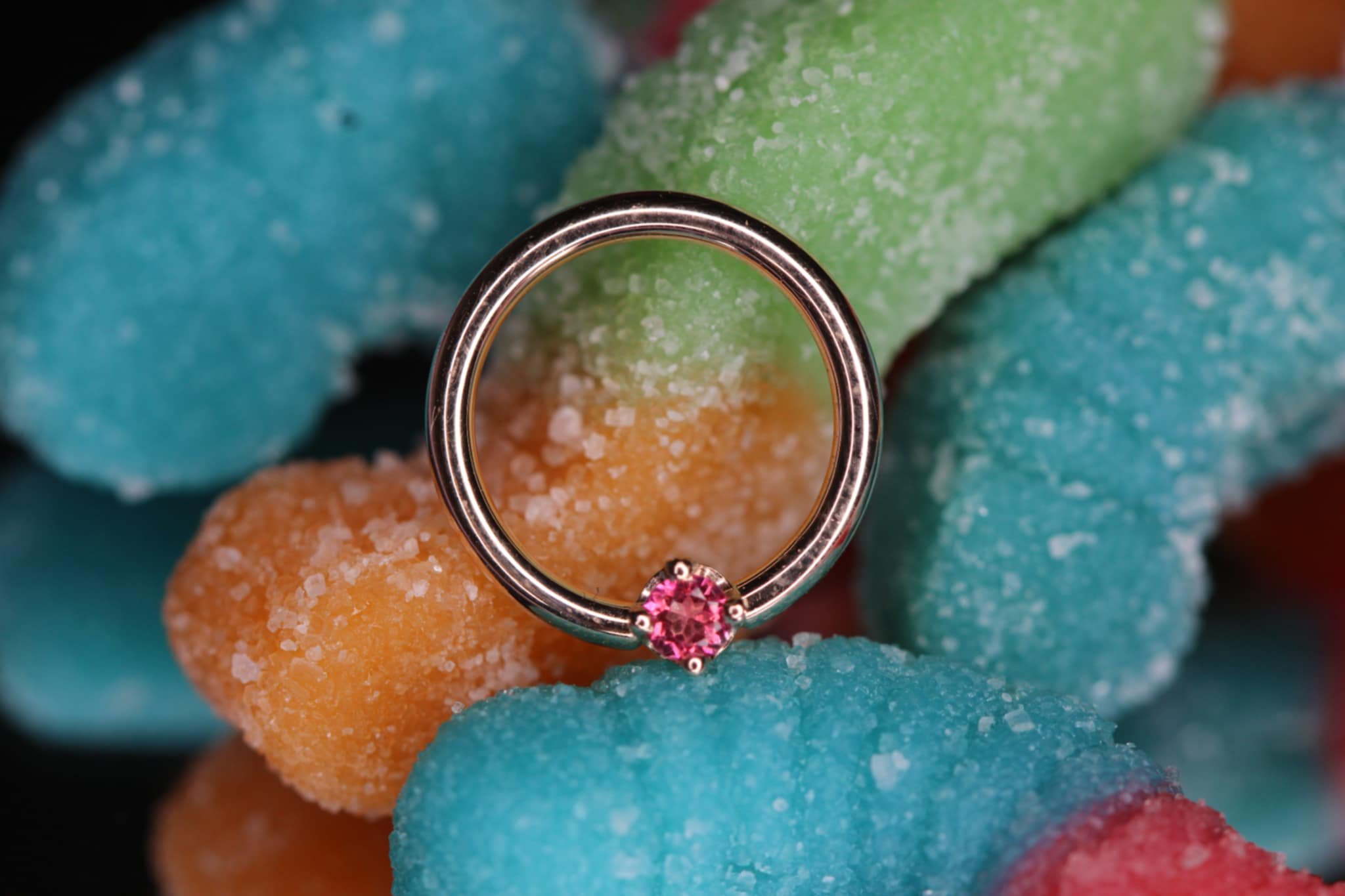 Yellow Gold fixed bead ring with Pink Topaz