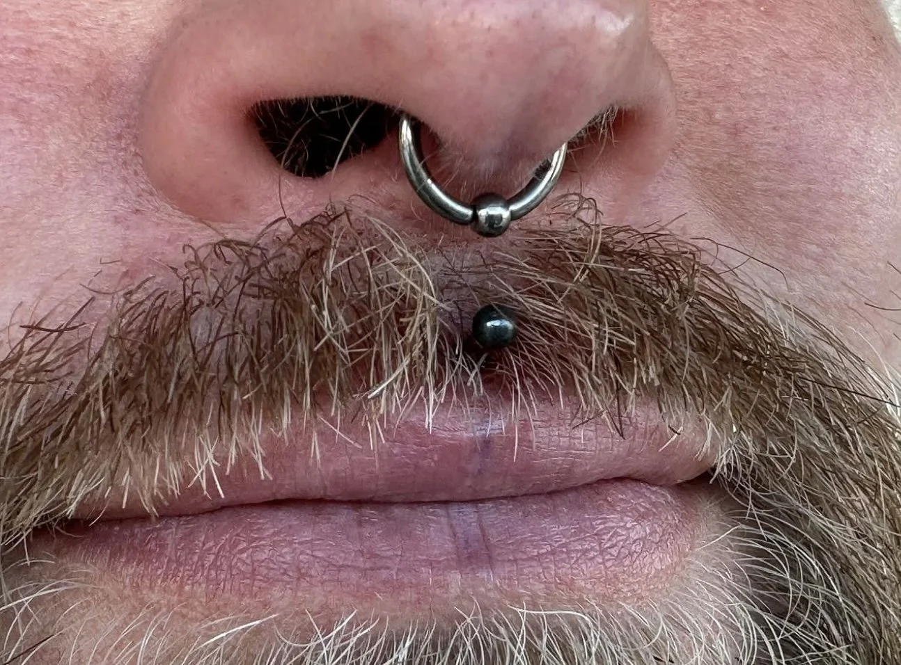 Philtrum and septum piercing 