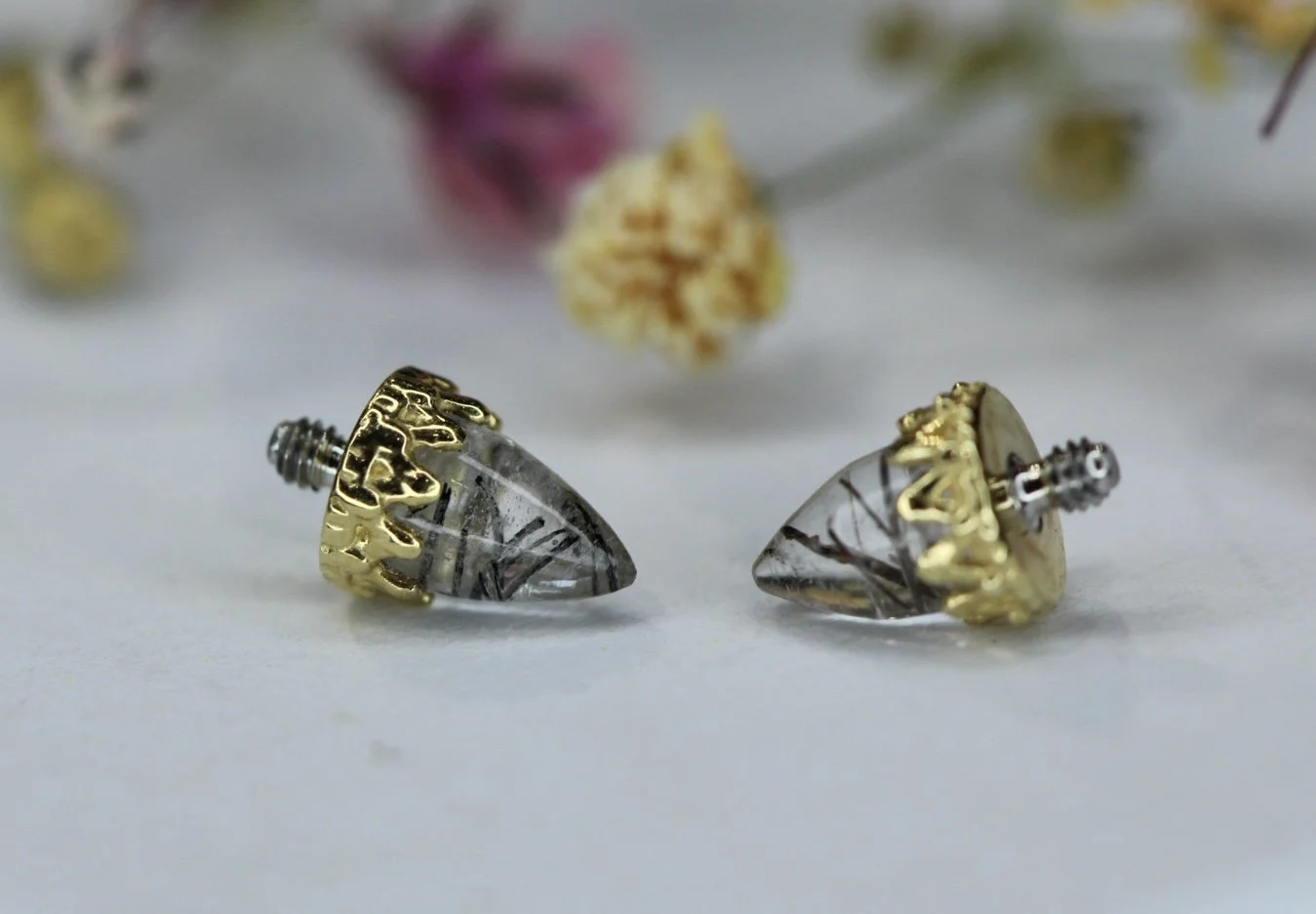 Anatometal bullet ends King Crown setting with Tourmalinated Quartz