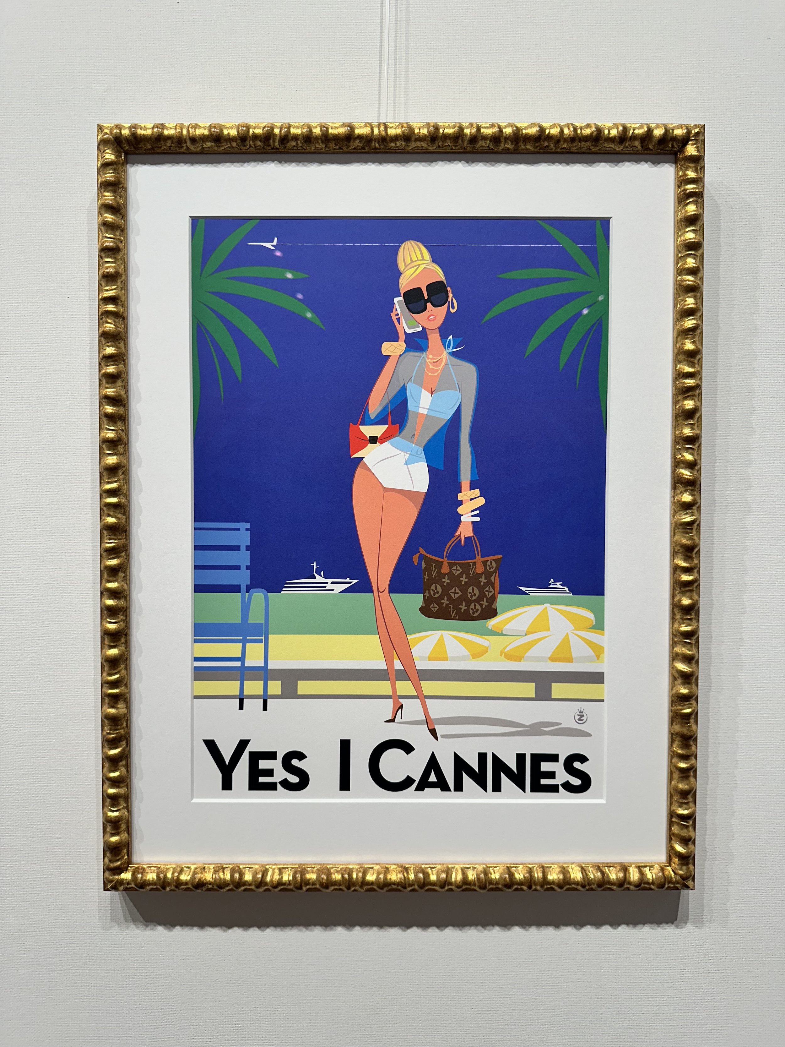 A colorful cartoon illustration of a fashionable woman in beachwear, wearing sunglasses and jewelry, holding a purse, standing by a pool with sailboats in the background and the caption "YES I CANNES."