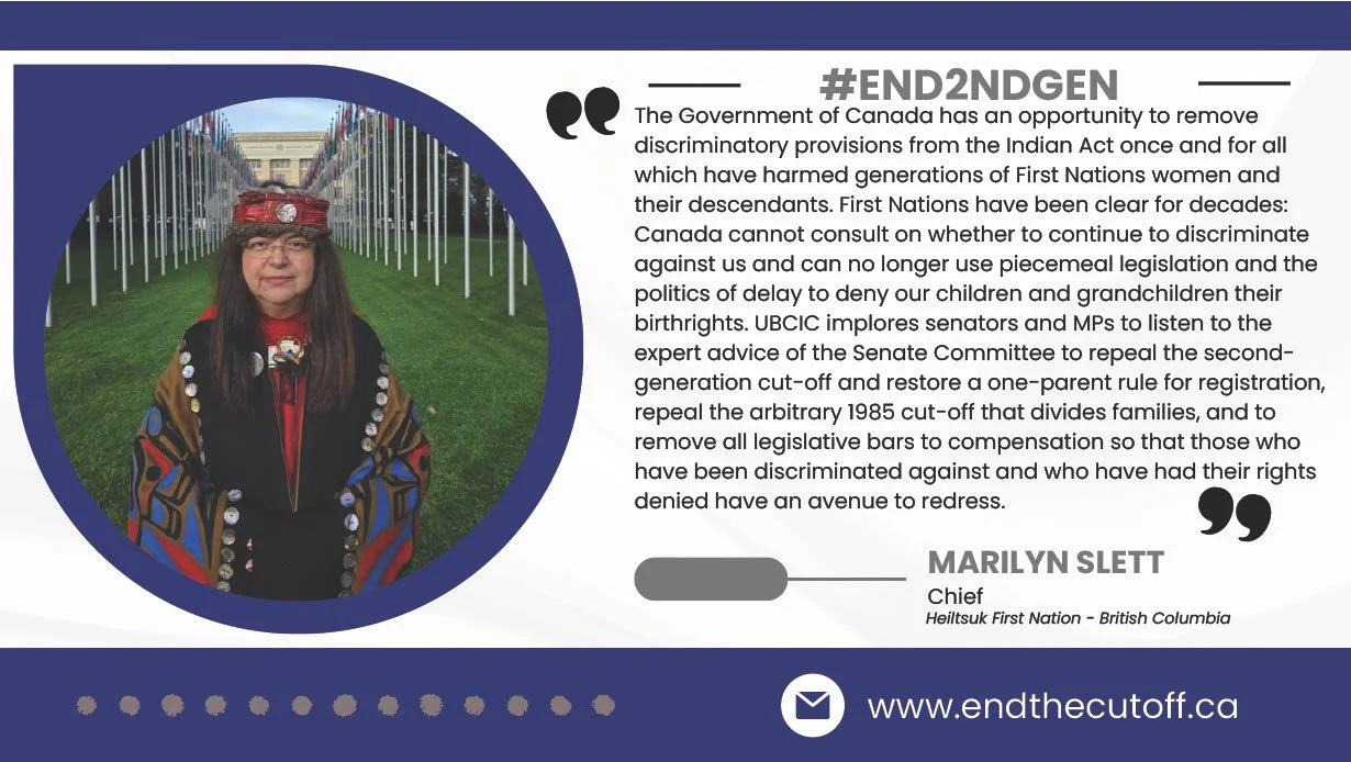 A woman wearing traditional Indigenous attire with a headband in a public park with flagpoles and a building in the background.