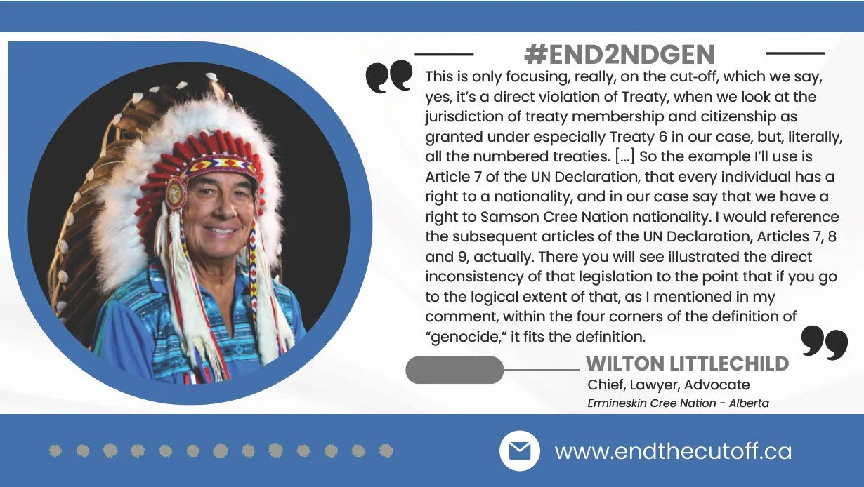 A man in traditional Indigenous Arctic clothing, including a feathered headdress and a blue garment, smiling against a dark background.