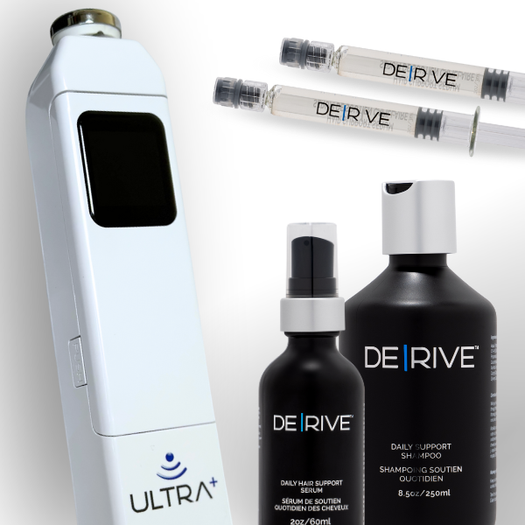 Hair care and styling products, including a white device, two syringes labeled 'DERIVE,' and two black bottles of Derive hair support serum and shampoo.