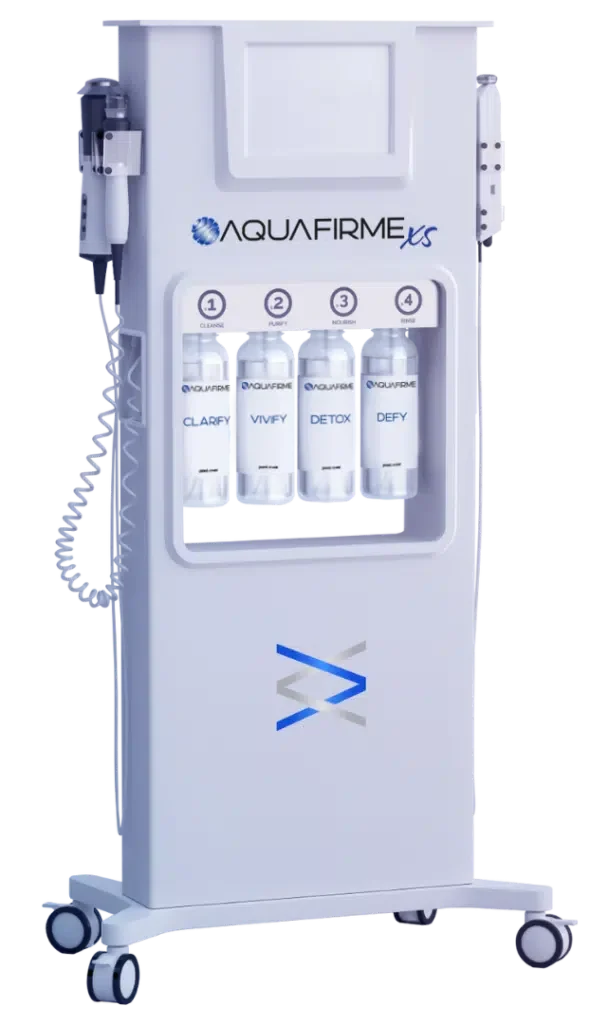 Medical device labeled AQUAFIRME XS with four bottles labeled Clarify, Vify, Detox, and Defy.